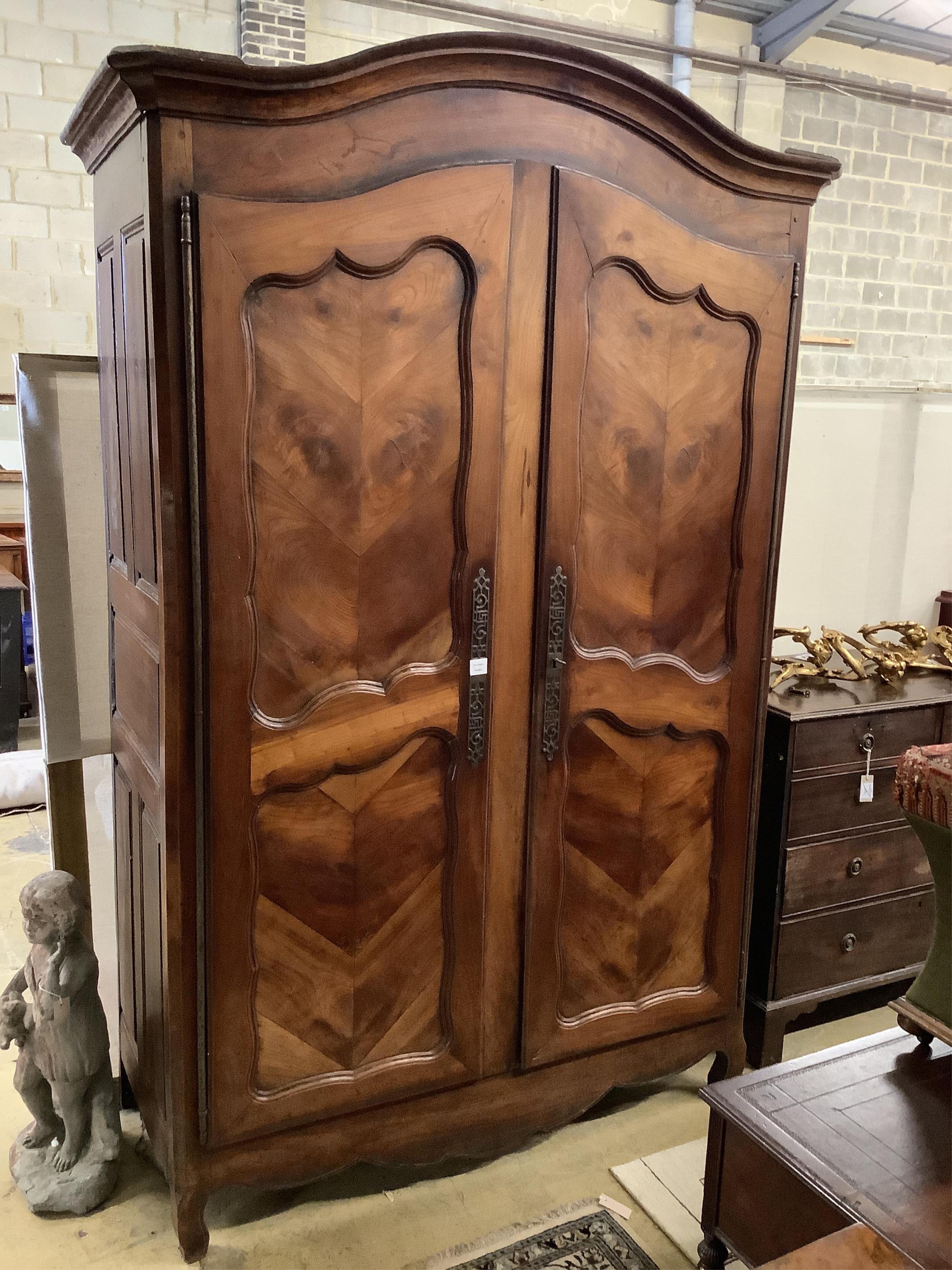 An 18th century French walnut armoire, width 150cm, depth 69cm, height 224cm. Condition - fair